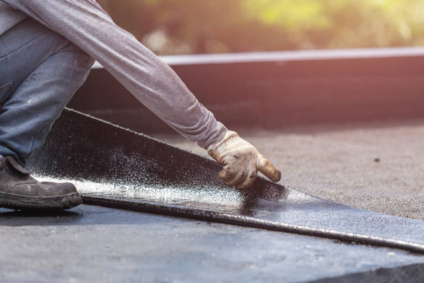 Professional Waterproofing technician working in Adelphi, OH